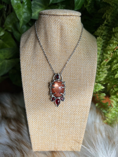 "Fier" sunstone and red garnet necklace