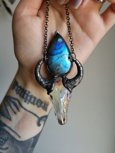 Blue labradorite and iridescent glass ox skull pendant