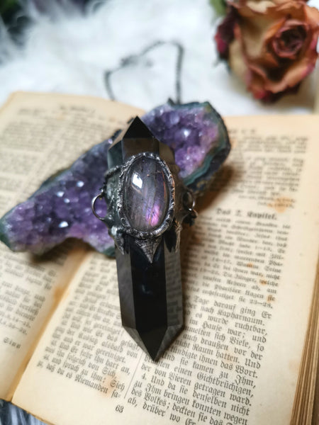 Black obsidian with purple labradorite