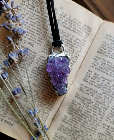 Small amethyst cluster pendant with claws