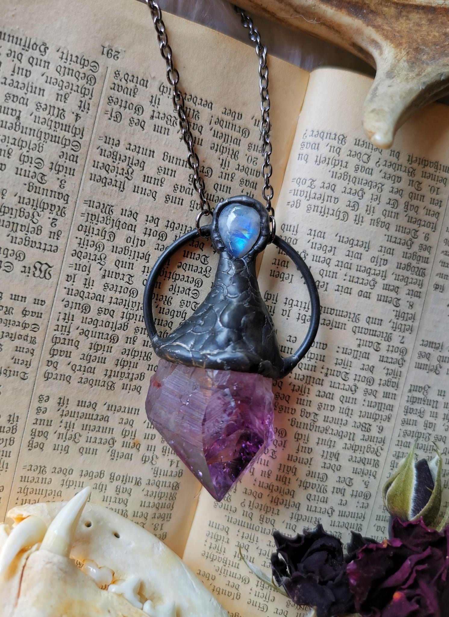 Amethyst point with moonstone #1
