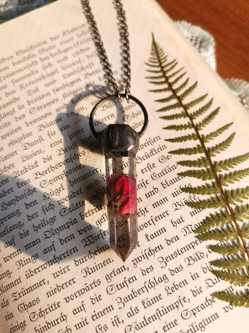 Resin crystal necklace with dried rose