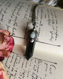Black obsidian crystal point pendant with moonstone