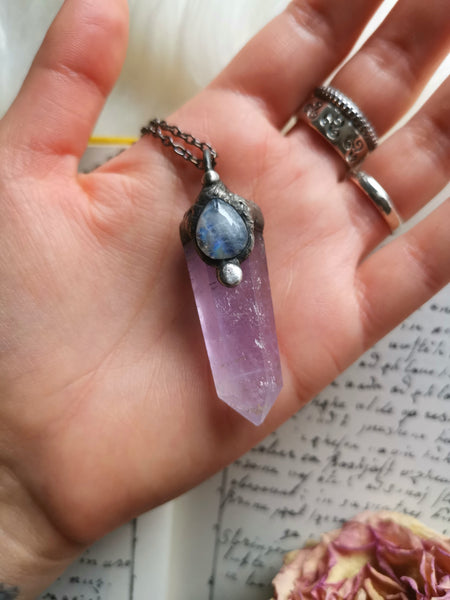 Amethyst crystal point with moonstone