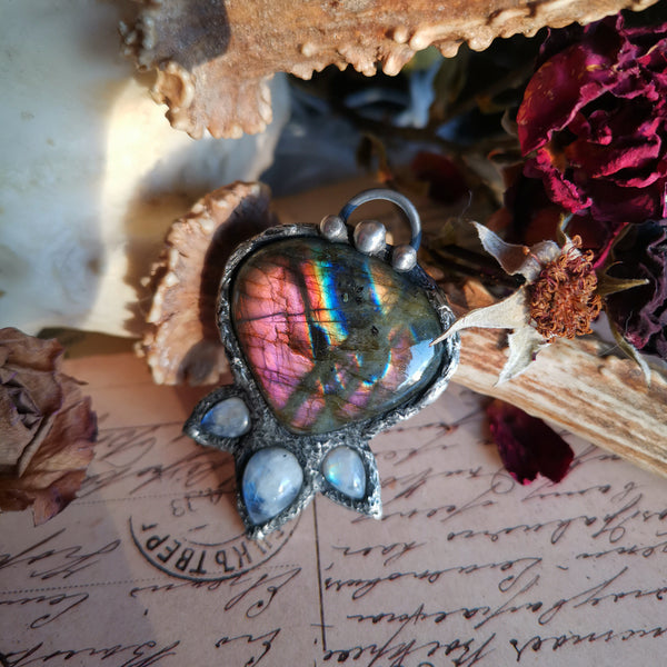 Pink/purple labradorite pendant with rainbow moonstones