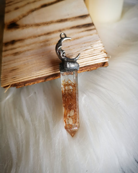 Resin crystal pendant with reindeer moss