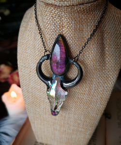 Iridescent glass ox skull pendant with pink/purple labradorite