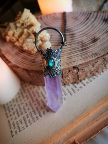 Ornate amethyst point pendant with labradorite