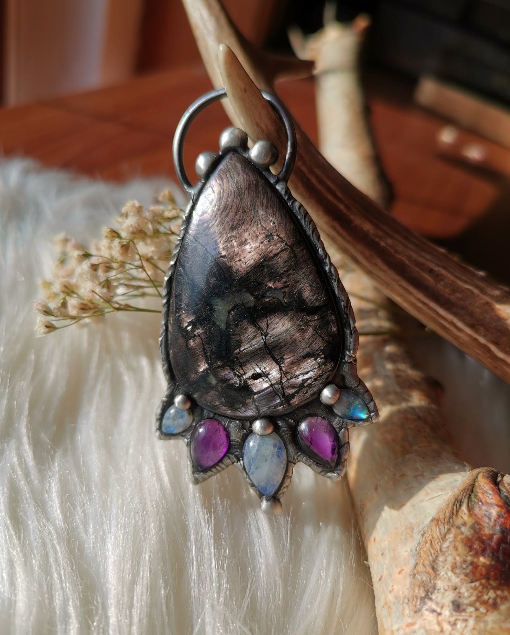 Hypersthene pendant with amethyst and rainbow moonstones