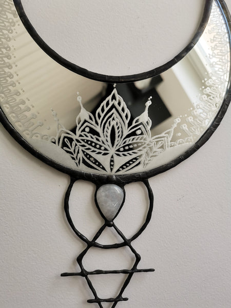 Ornate engraved crescent mirror with moonstone