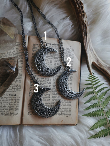 Ornate crescent moon necklace