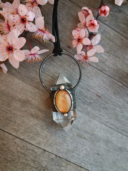 Clear quartz and golden rutilated quartz pendant