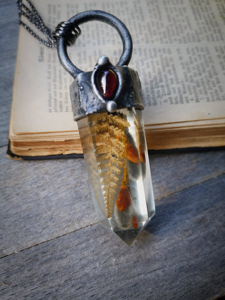 Botanical crystal pendant with garnet