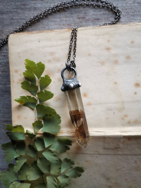 Resin crystal necklace with butterfly wing