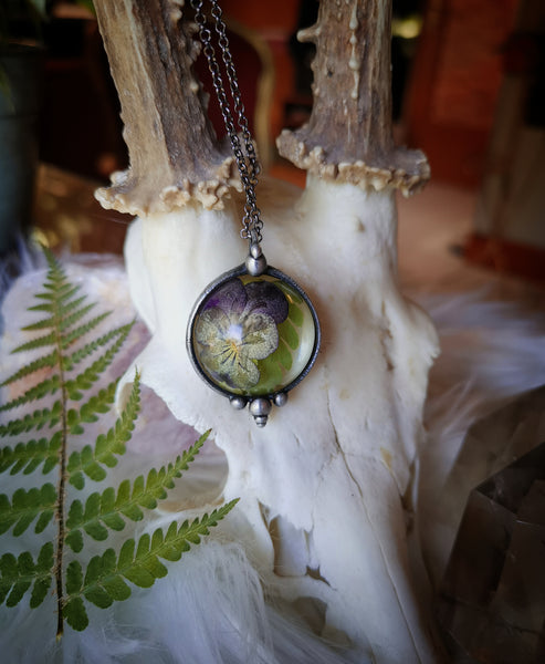 Resin pendant with viola flower and fern