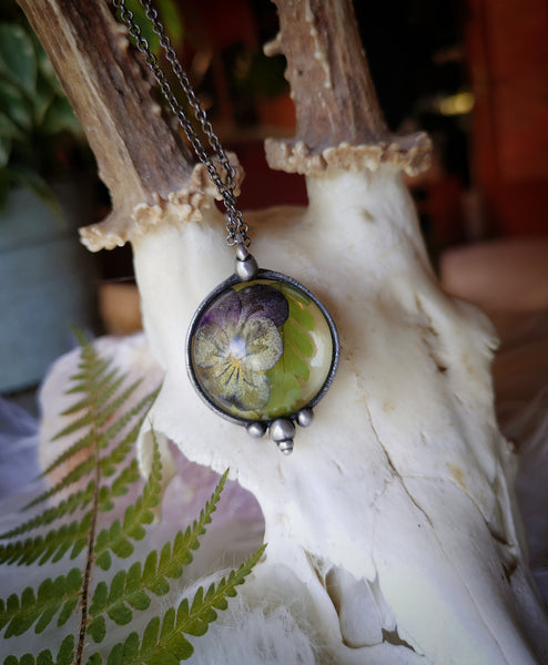 Resin pendant with viola flower and fern