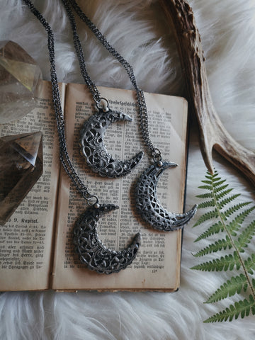 Ornate crescent moon necklace