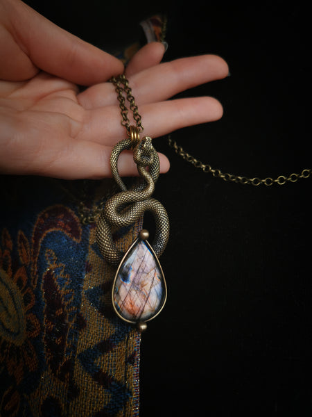 "Brass serpent necklace" with pastel pink labradorite