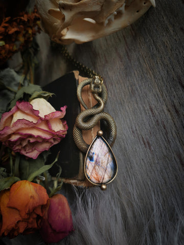 "Brass serpent necklace" with pastel pink labradorite